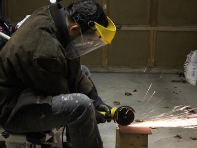 IMG 5134  I love using the grinders - they make a lot of sparks and they work! Cuts through steel and concrete beautifully.