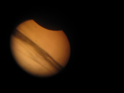 Partial Solar Eclipse  cloud cover, afocal shot through a 4" newtonian telescope