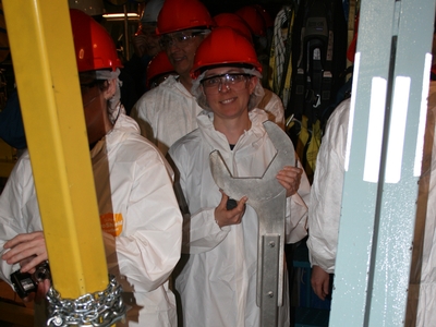 IMG 0787  My wife Magdalena, holding the wrench used to tighten the bolts holding the 10 m diameter sphere suspended in a giant cavern.